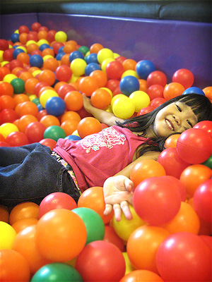 Cleo in coloured balls