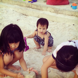 The girls enjoying the sand