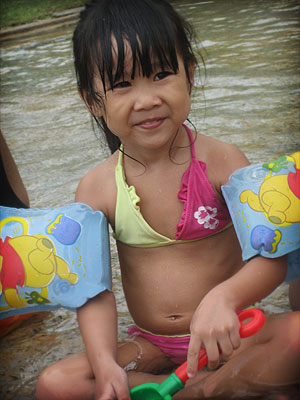 Cleo sitting in Pool