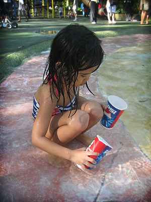 Cleo playing with water