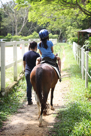 Clié riding a pony